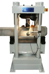 Railway sleeper compression machine